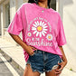 Unisex vintage T-shirt met madeliefjesprint en losse pasvorm